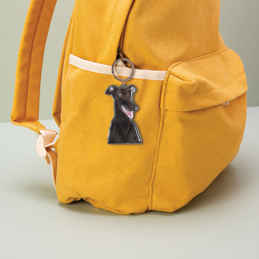 black greyhound dog watercolour artwork enamel keychain on yellow canvas backpack