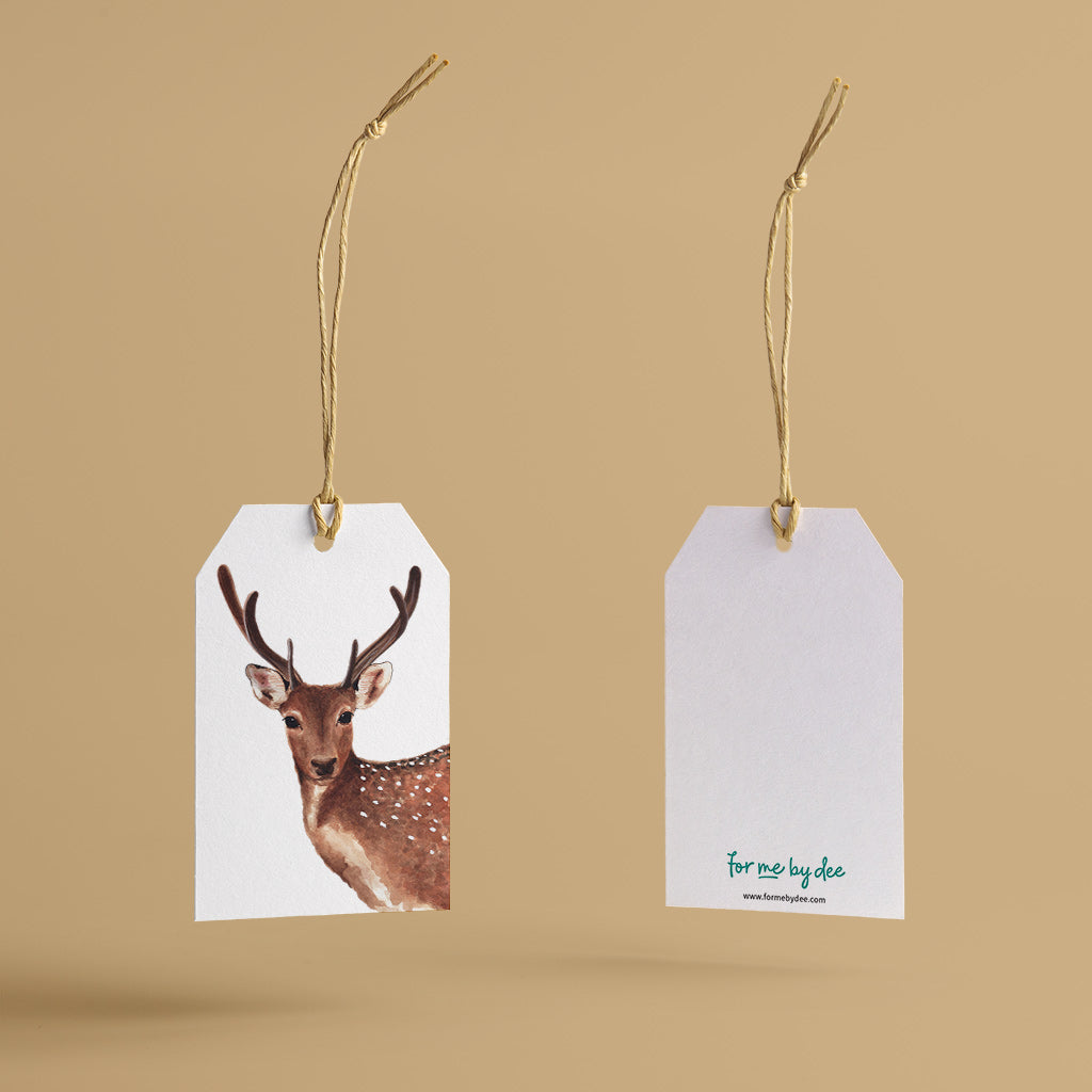 deer wild animal gift tag with twine string on mustard background