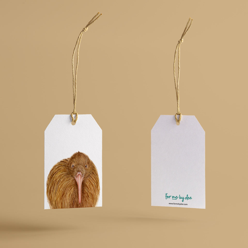 kiwi new zealand bird painted on gift tag with twine string on mustard background