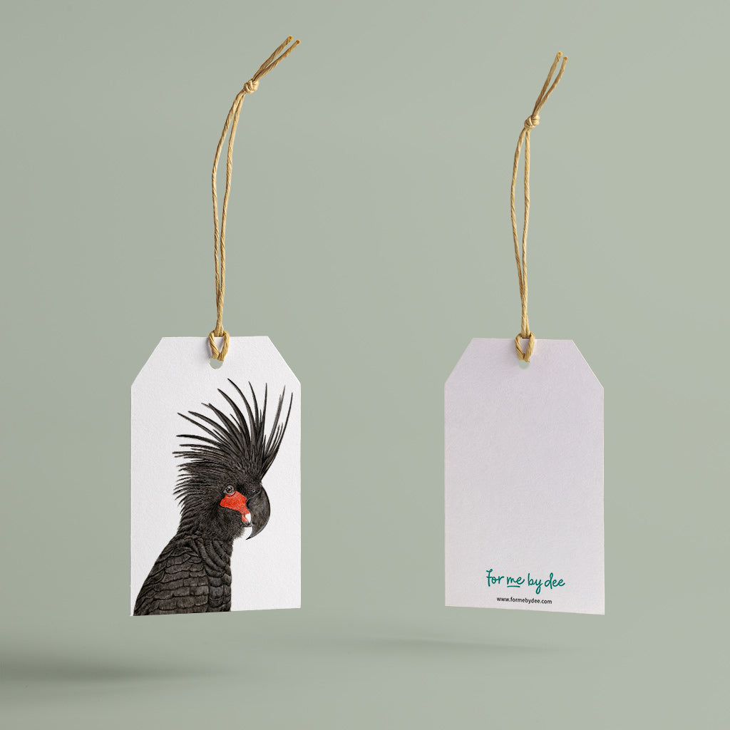 palm cockatoo australian bird gift tag with twine string on green background