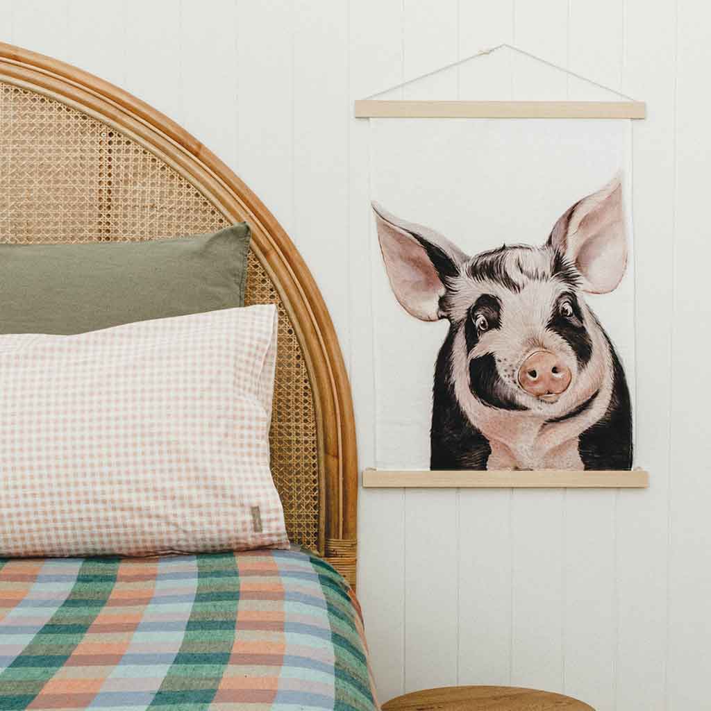 pig watercolour artwork linen tea towel hanging as artwork in bedroom